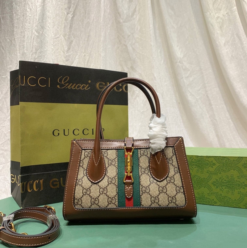 G*u*i shopping bags
